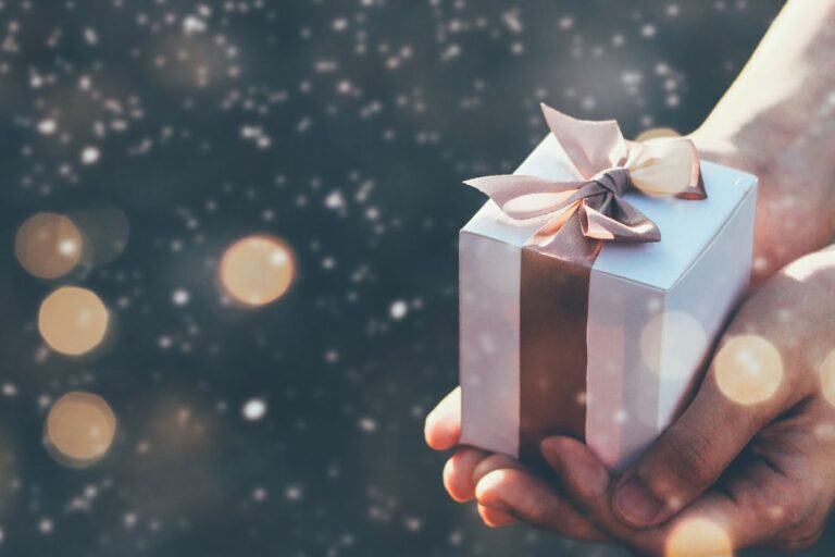 A woman holding her work anniversary gift