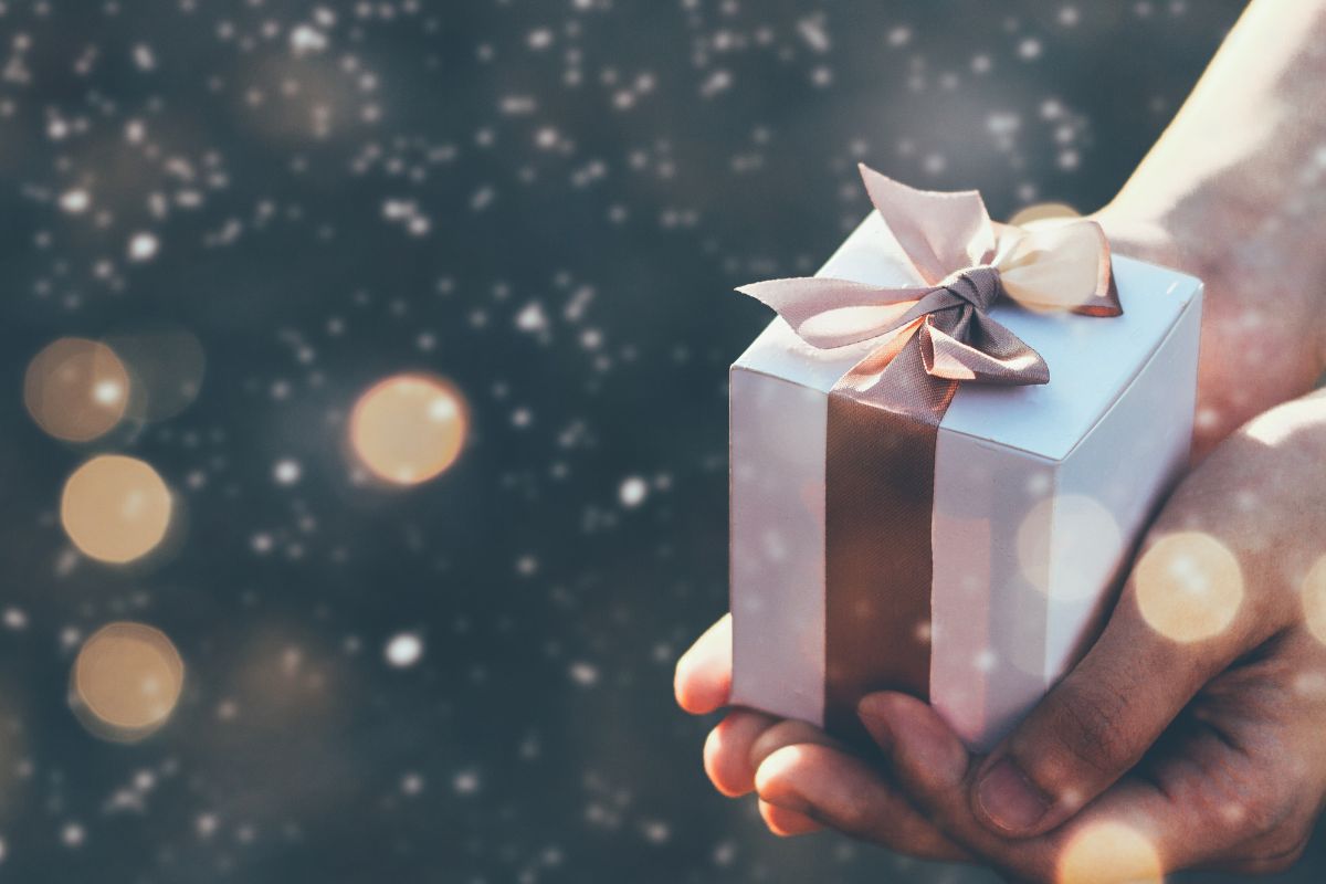 A woman holding her work anniversary gift