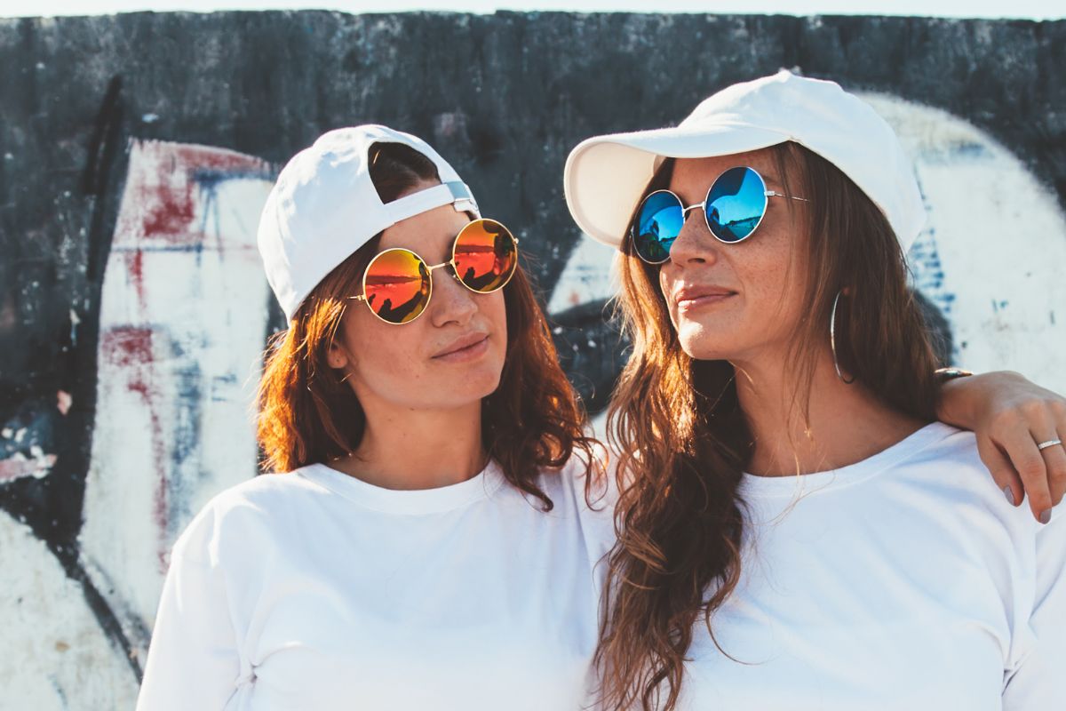 Two girls showing swag outfits