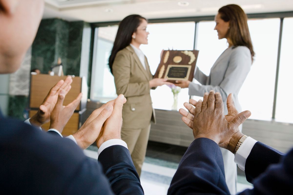 An employee receiving an award