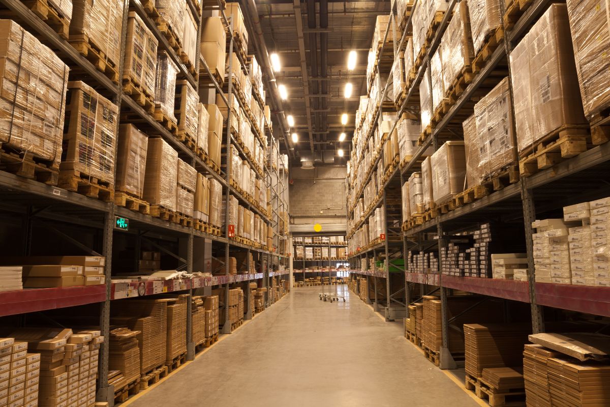 Company Warehouse With Cardboard Boxes of sustainable swag products