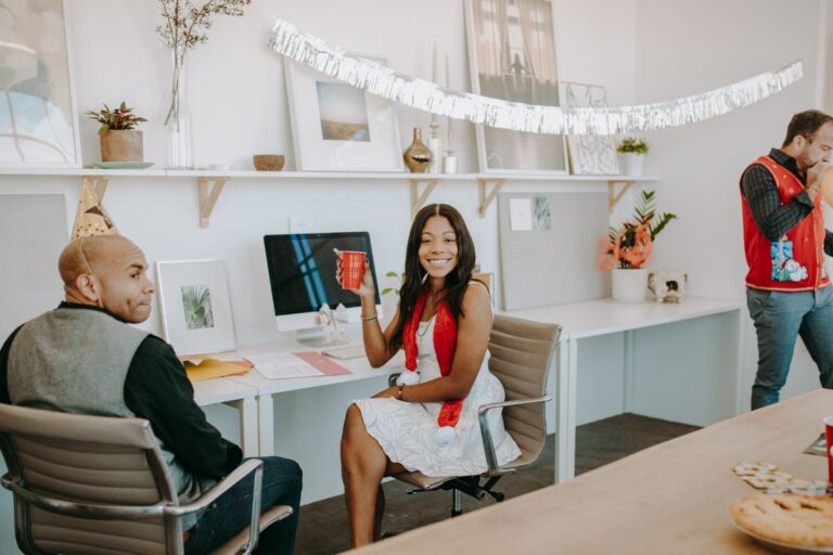 Employees celebrating december and christmas engagement ideas