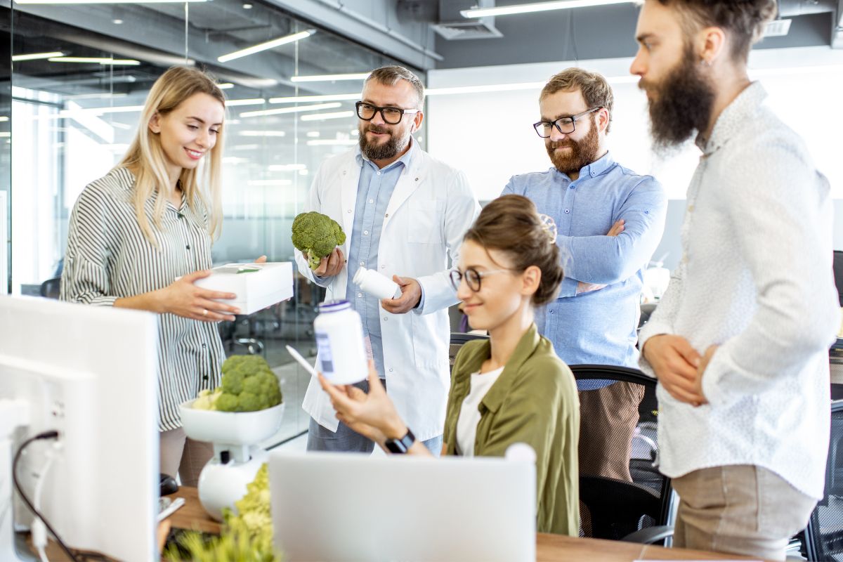 Employees checking sustainable swag products made by company