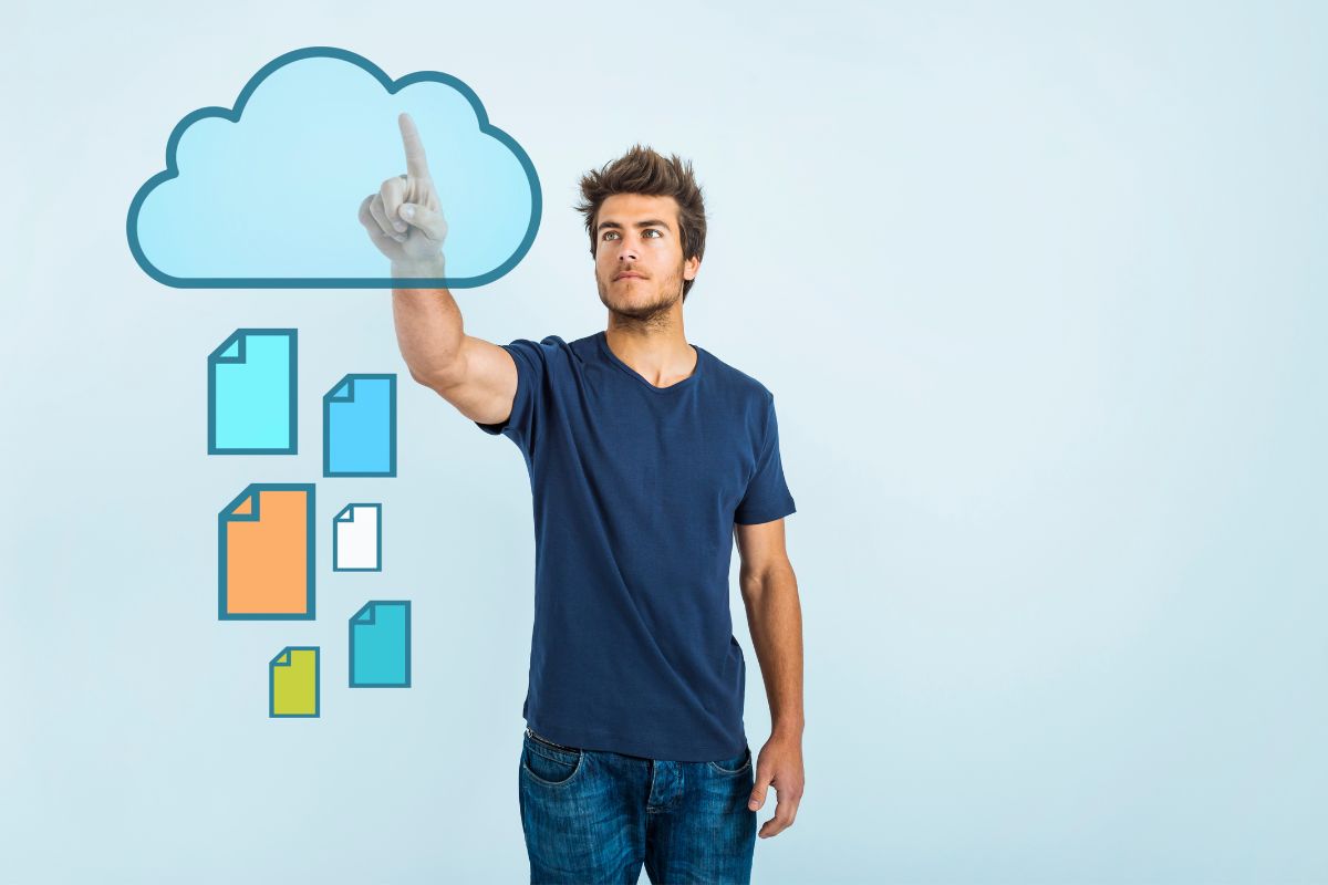 Man touching a virtual cloud