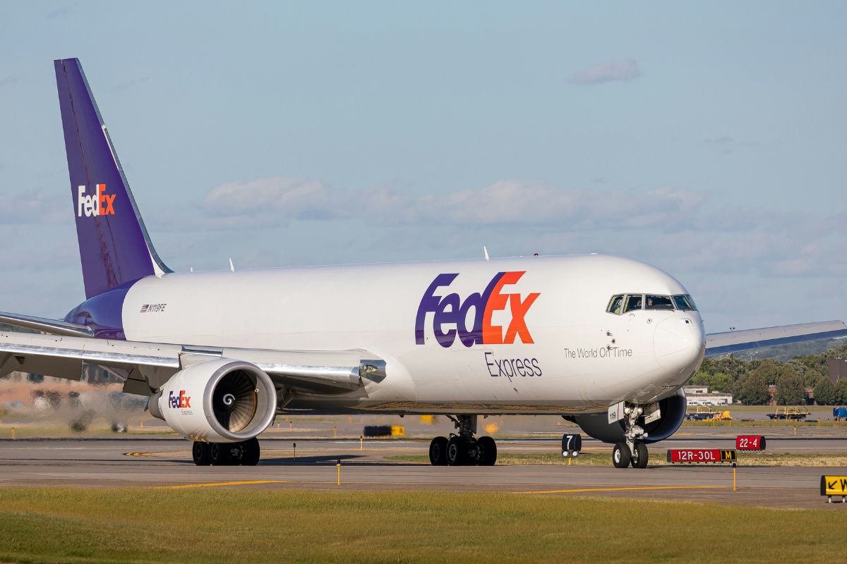 A FedEx cargo plane on the runway
