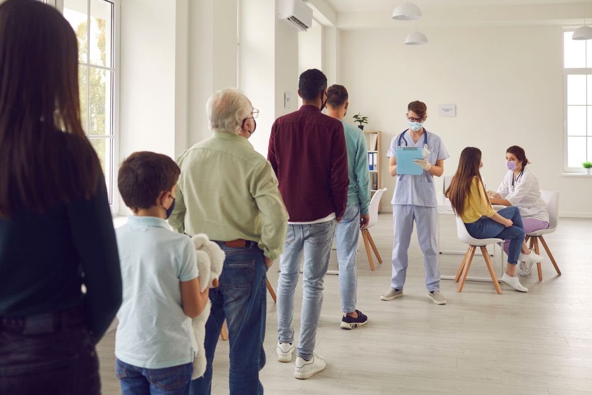 People eagerly line up to participate in health check ups during health campaign