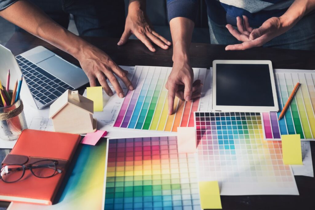 A group of people choosing comfort color from a color pallete