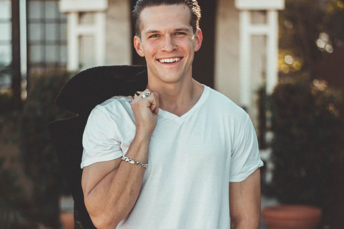 A guy looking stylish with V Neck T Shirt