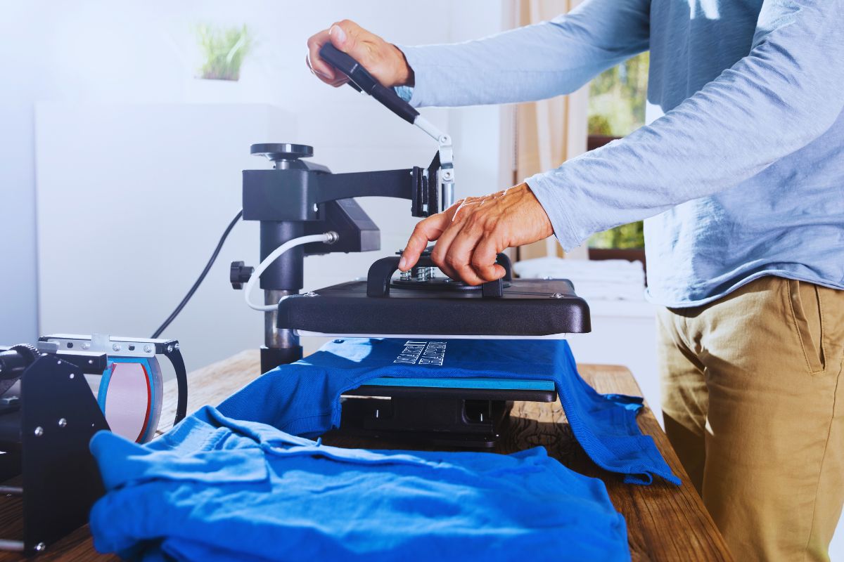 A guy printing high quality T shirts