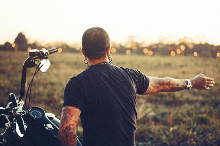 A guy wearing a black biker t shirt
