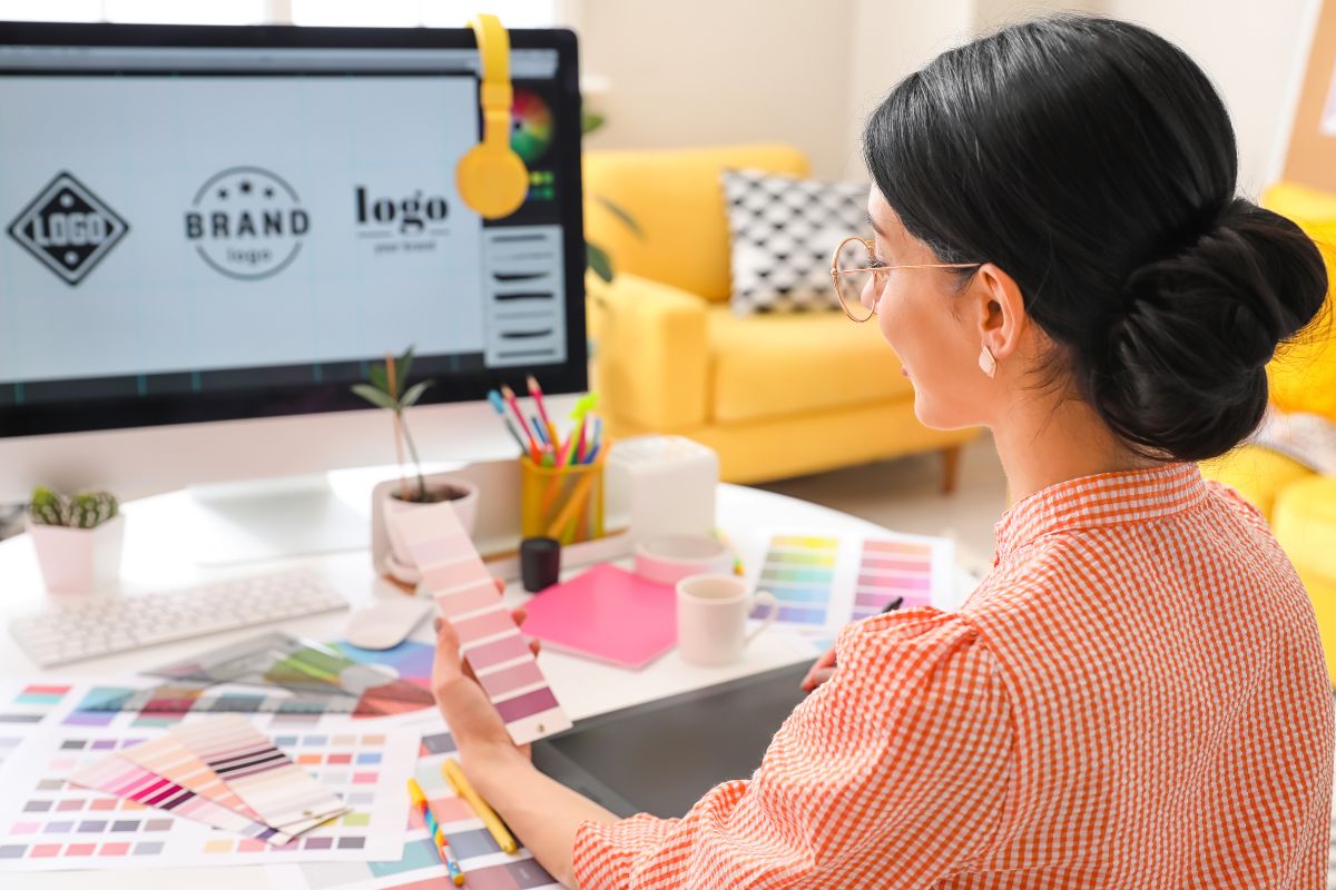 A lady designing logo on computer
