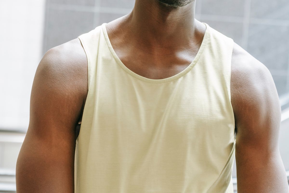 A man wearing muscle tank top