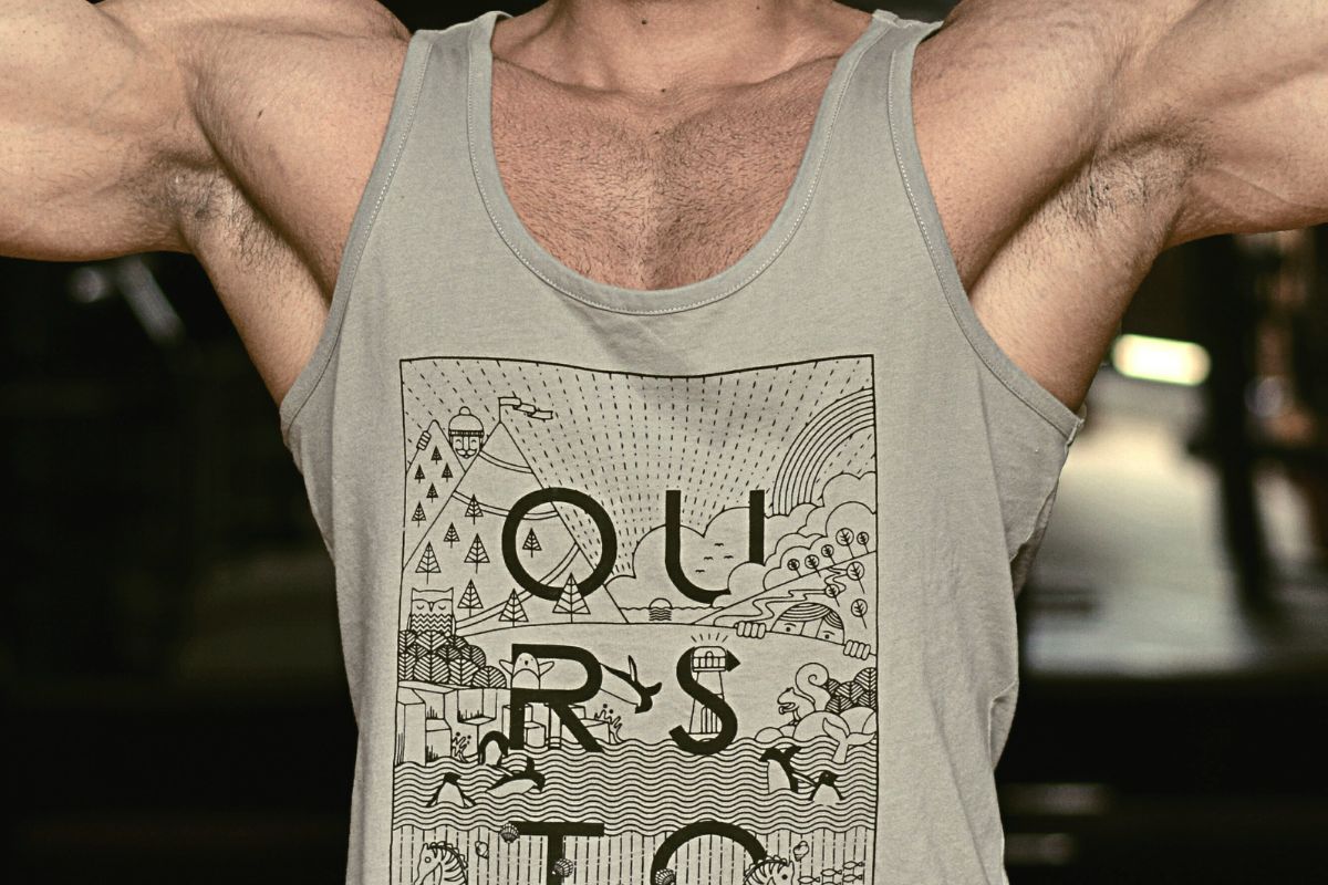 A man wearing trendy tank top