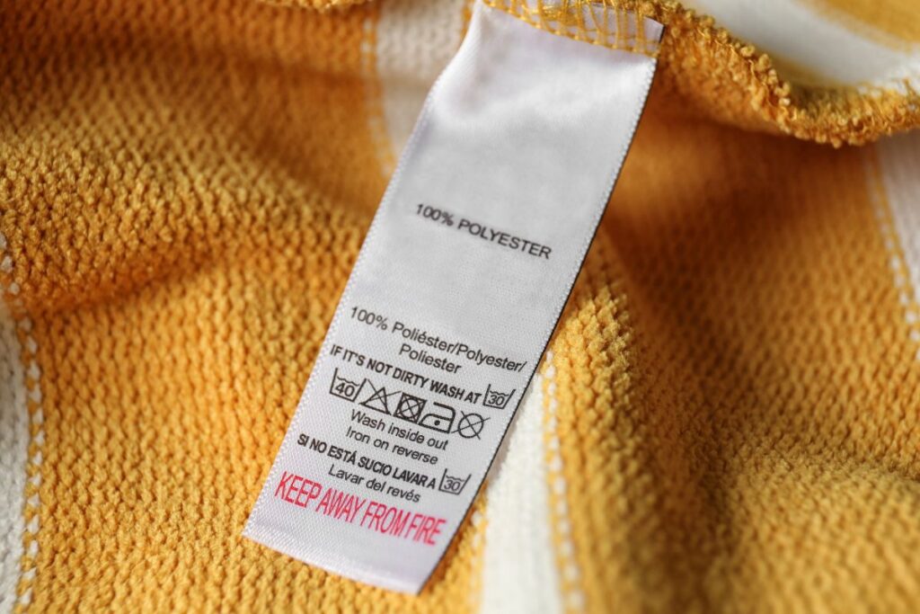A polyester cloth with its lable shown in the image.