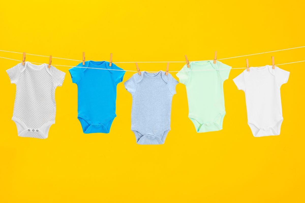 Air drying baby body clothes on a washing line