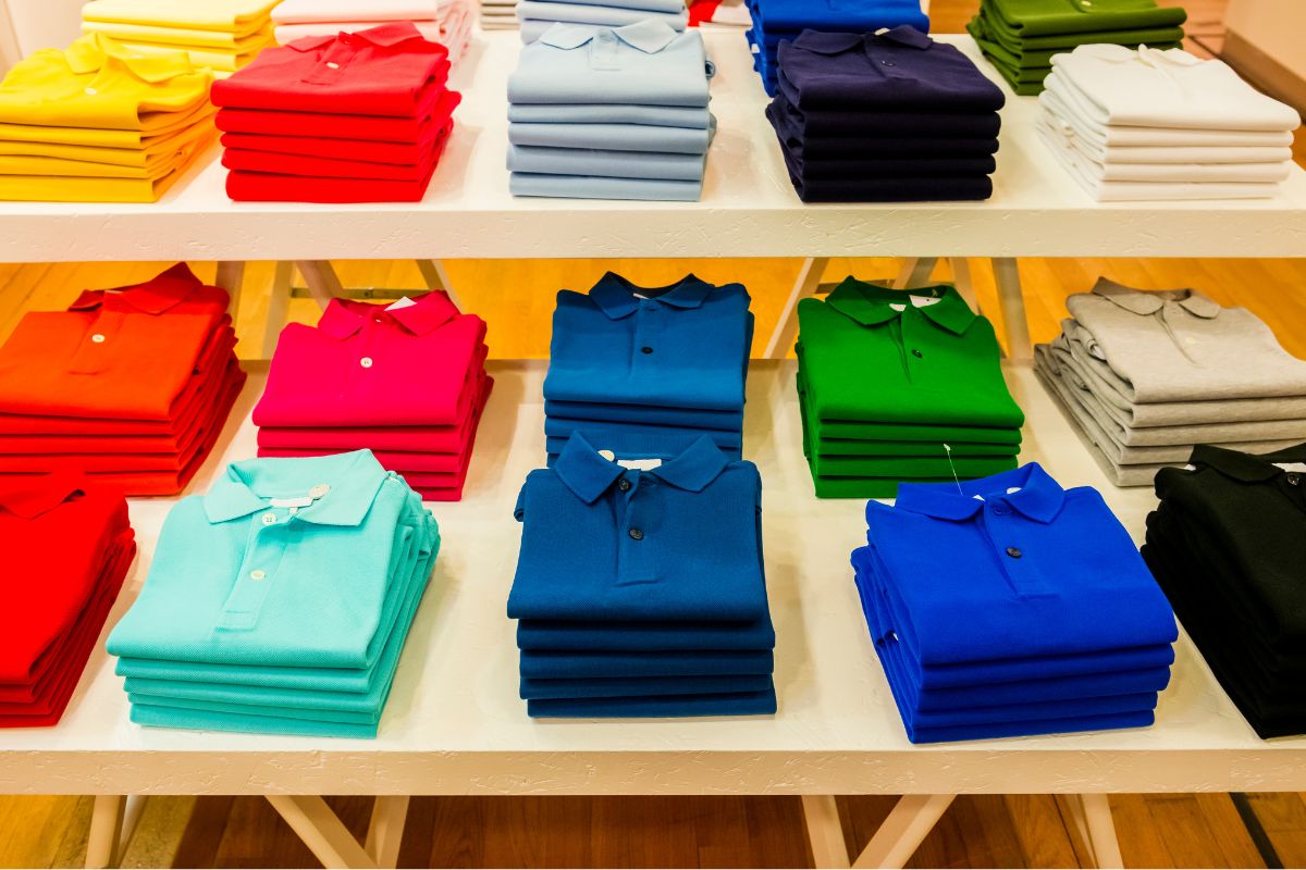 Different colored polo shirts for customization process kept together.