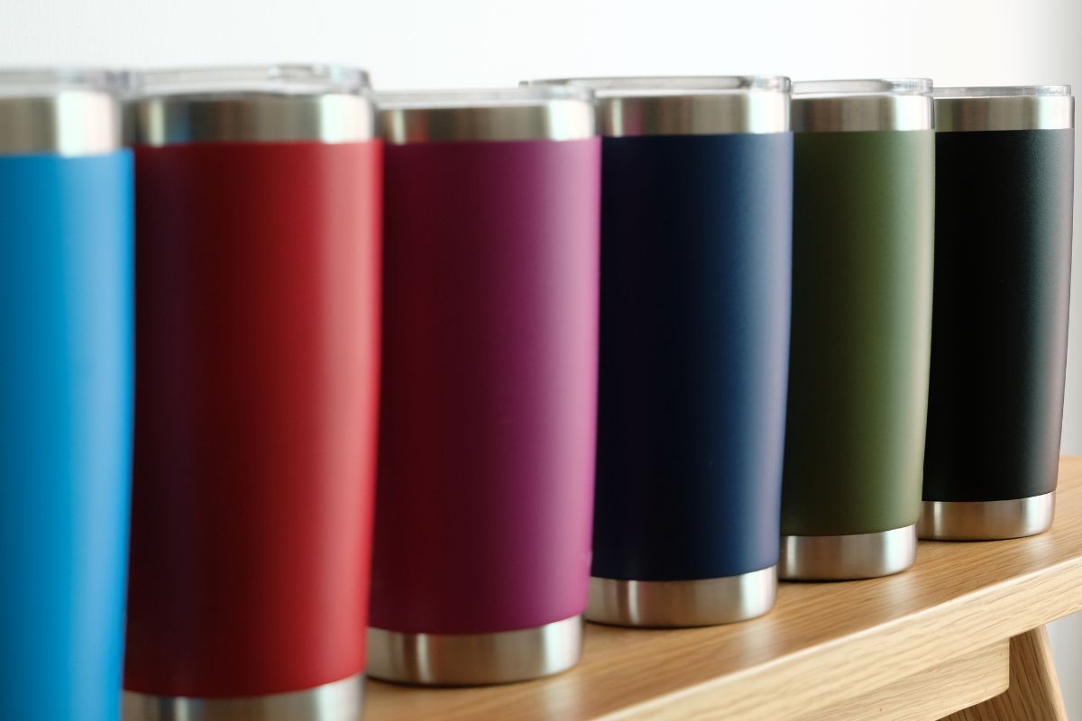 Different colored tumblers kept together as a gifts for newly hired employees
