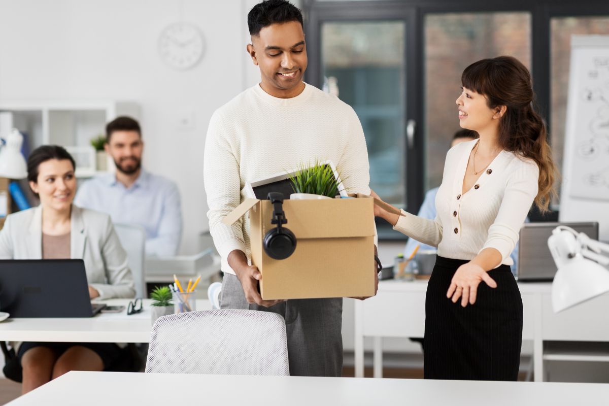 Newly hired employee being welcomed by other employees.