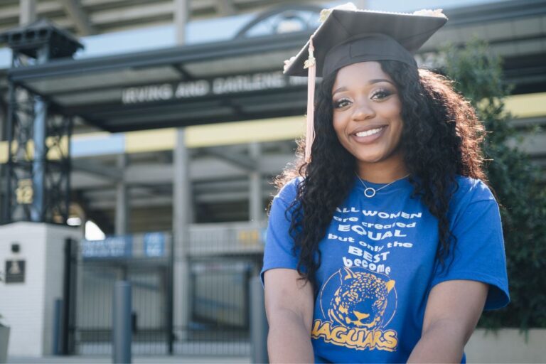 Woman celebrating graduation day wearing t shirt