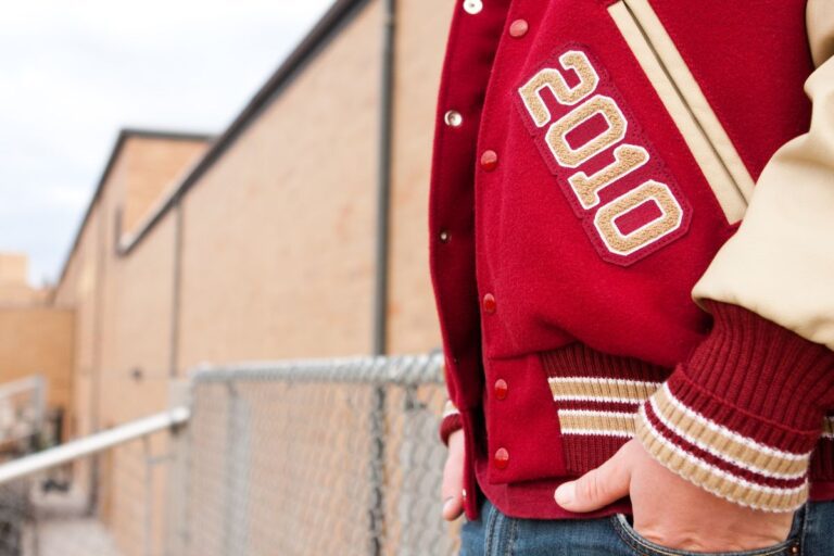 Year 2010 stitched to a jacket an via tackle and twill.