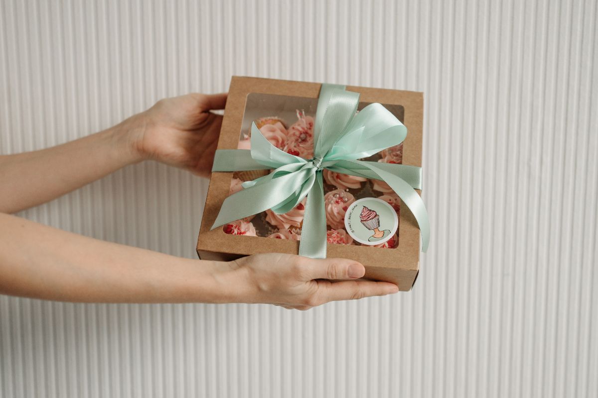 A girl is lying with cooperative thankyou gift