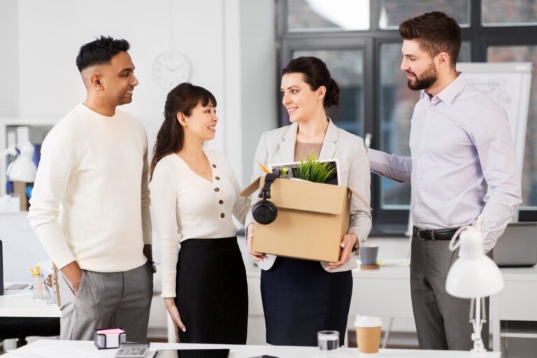 Welcoming new employee to the office by other team members.