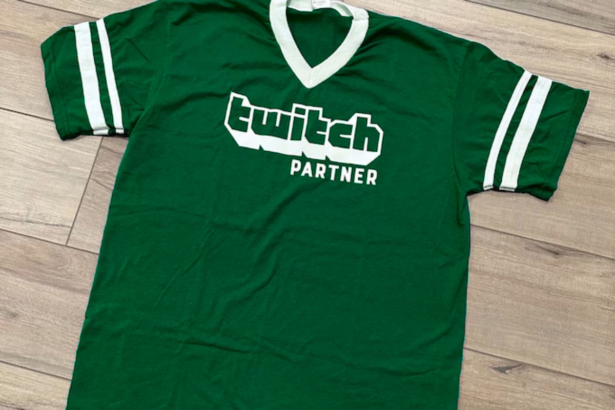 A t shirt for with twitch logo printed on it.