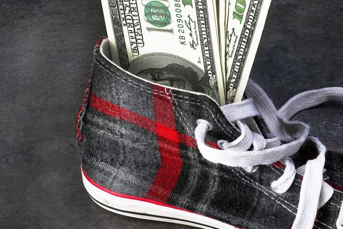 Money kept inside the custom shoe showing its cost