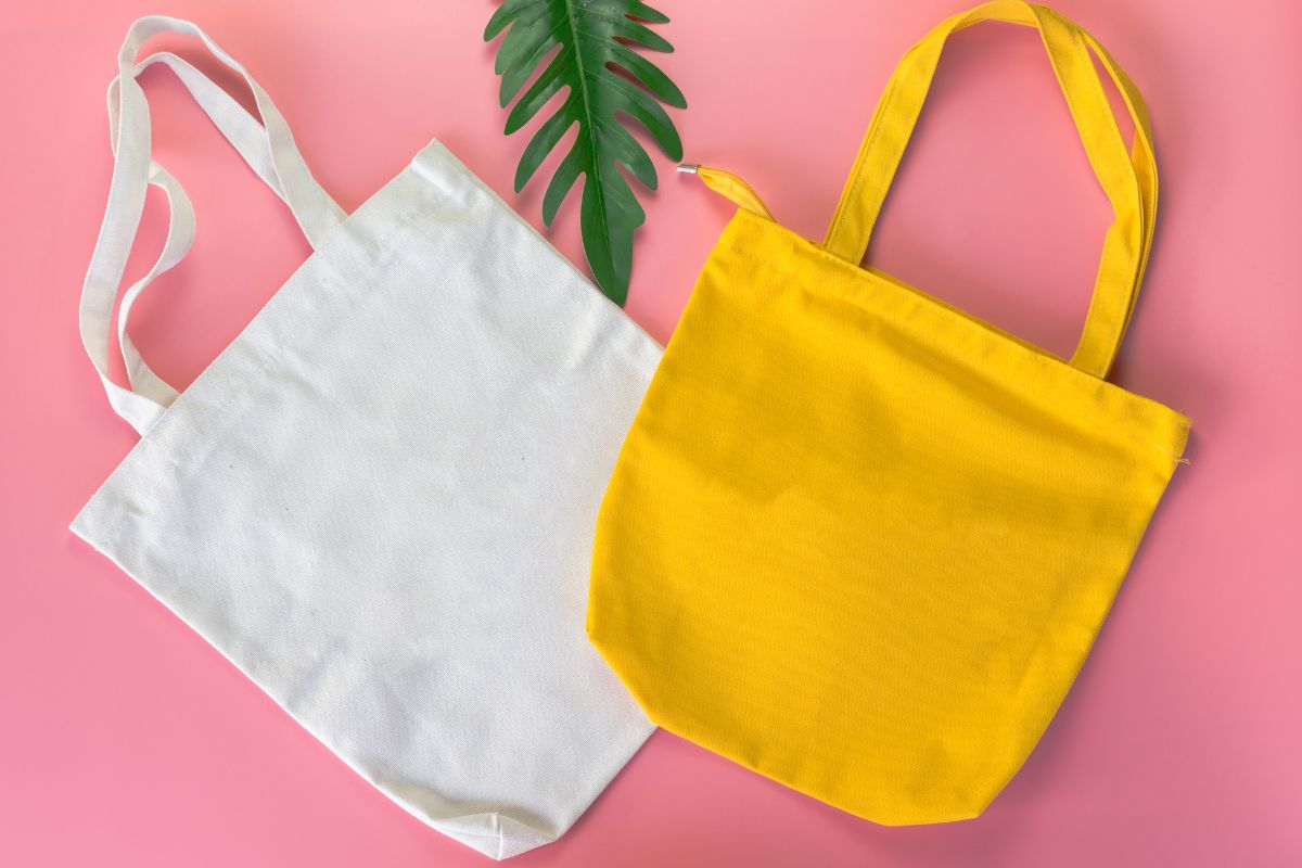 Two different colored custom tote bag kept with each other
