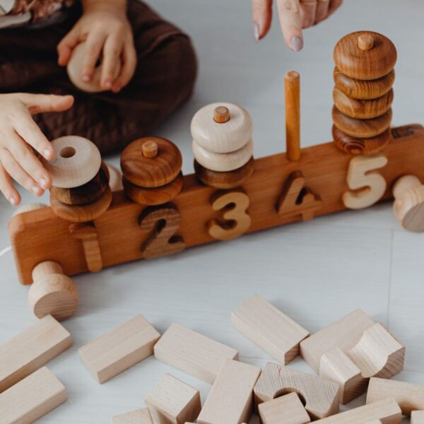 A child playing with custom educational toys