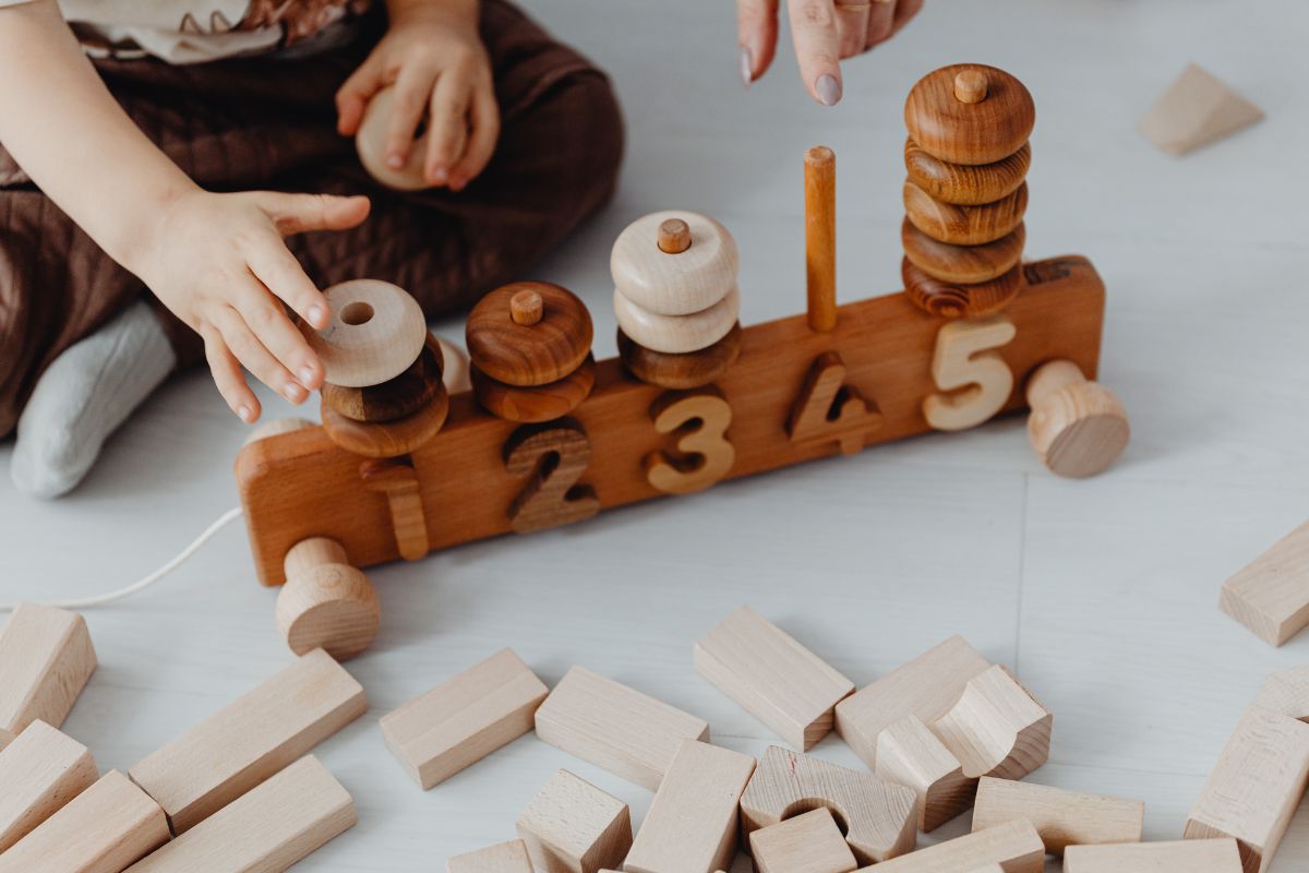 A child playing with custom educational toys