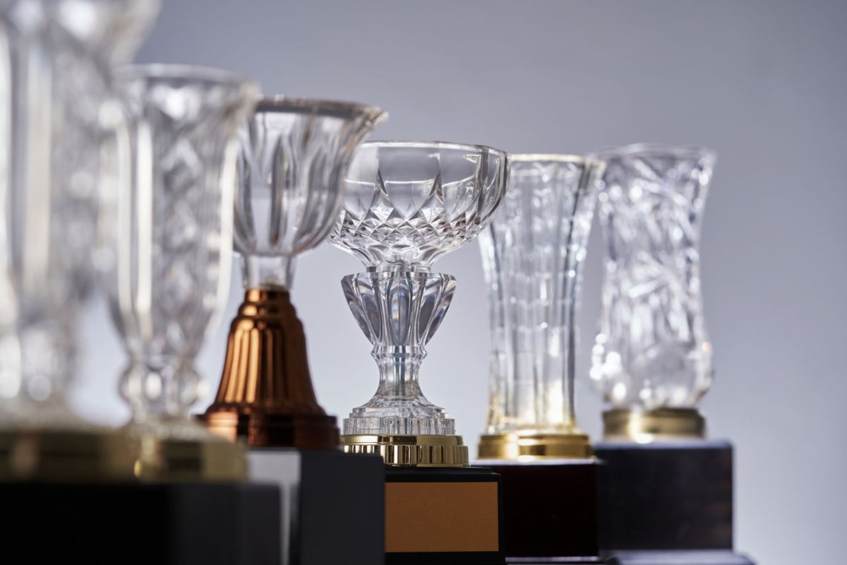 A collection of custom crystal award kept together