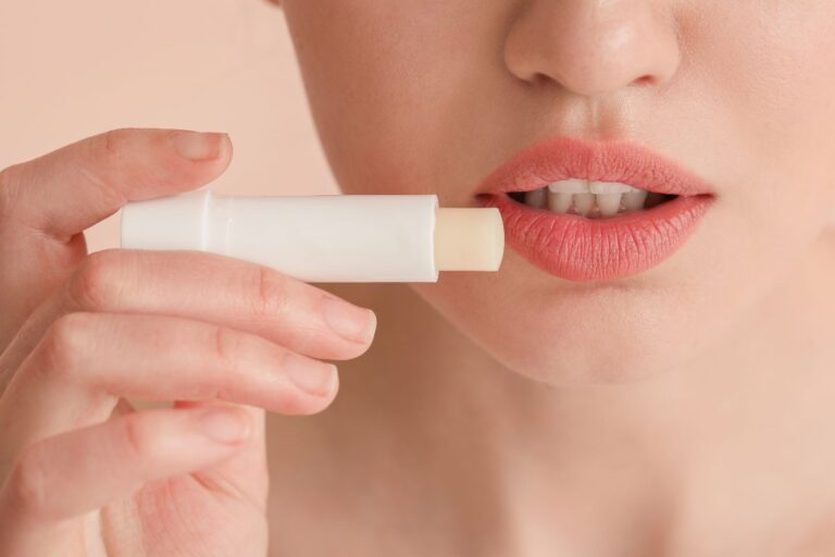 A lady using Custom lip balm