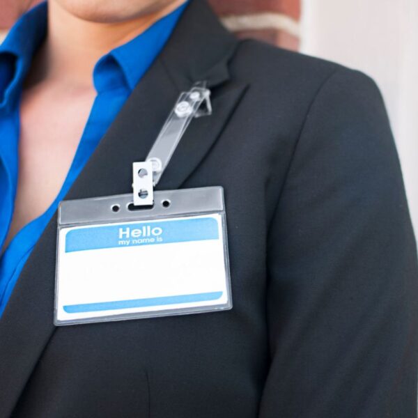 A lady wearing custom name badge