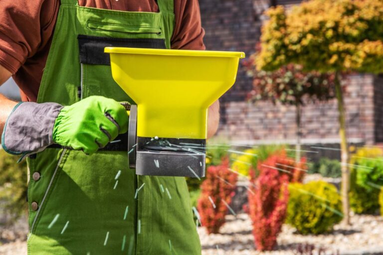 A person is using a custom lawn and gardening product