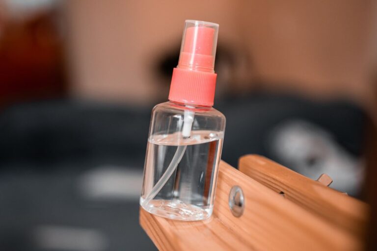 A bottle of custom lens cleaner shown in the image