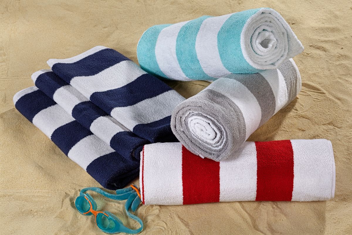 A collection of custom beach towels kept with each other