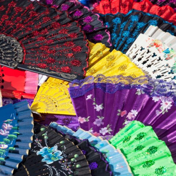 A collection of custom printed handfans shown in the image