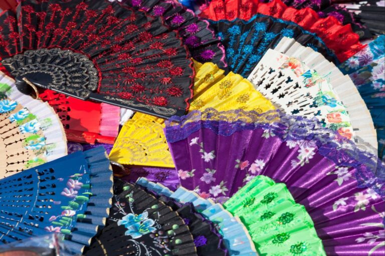 A collection of custom printed handfans shown in the image