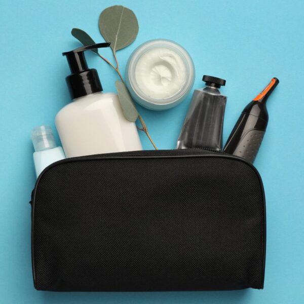 A custom toiletry bag with som products inside it