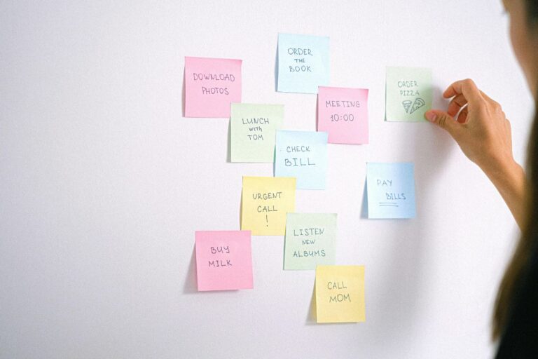 A lady is using custom sticky notes to remember important things