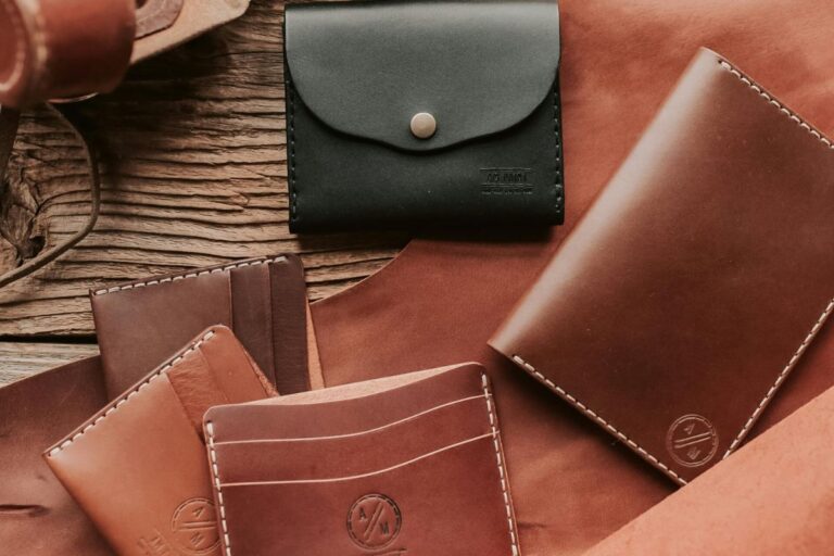 A variety of custom wallets in different colors placed together