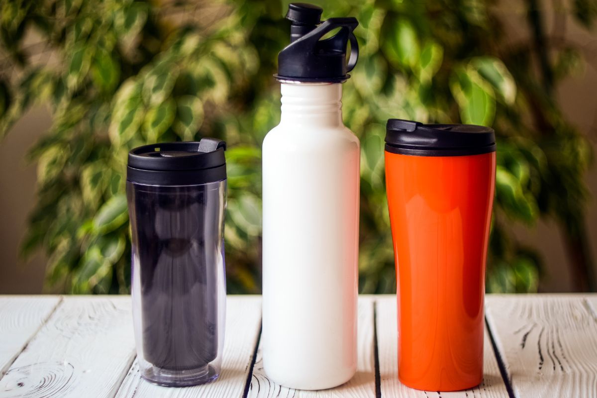 Custom water bottles of different sizes kept on a table