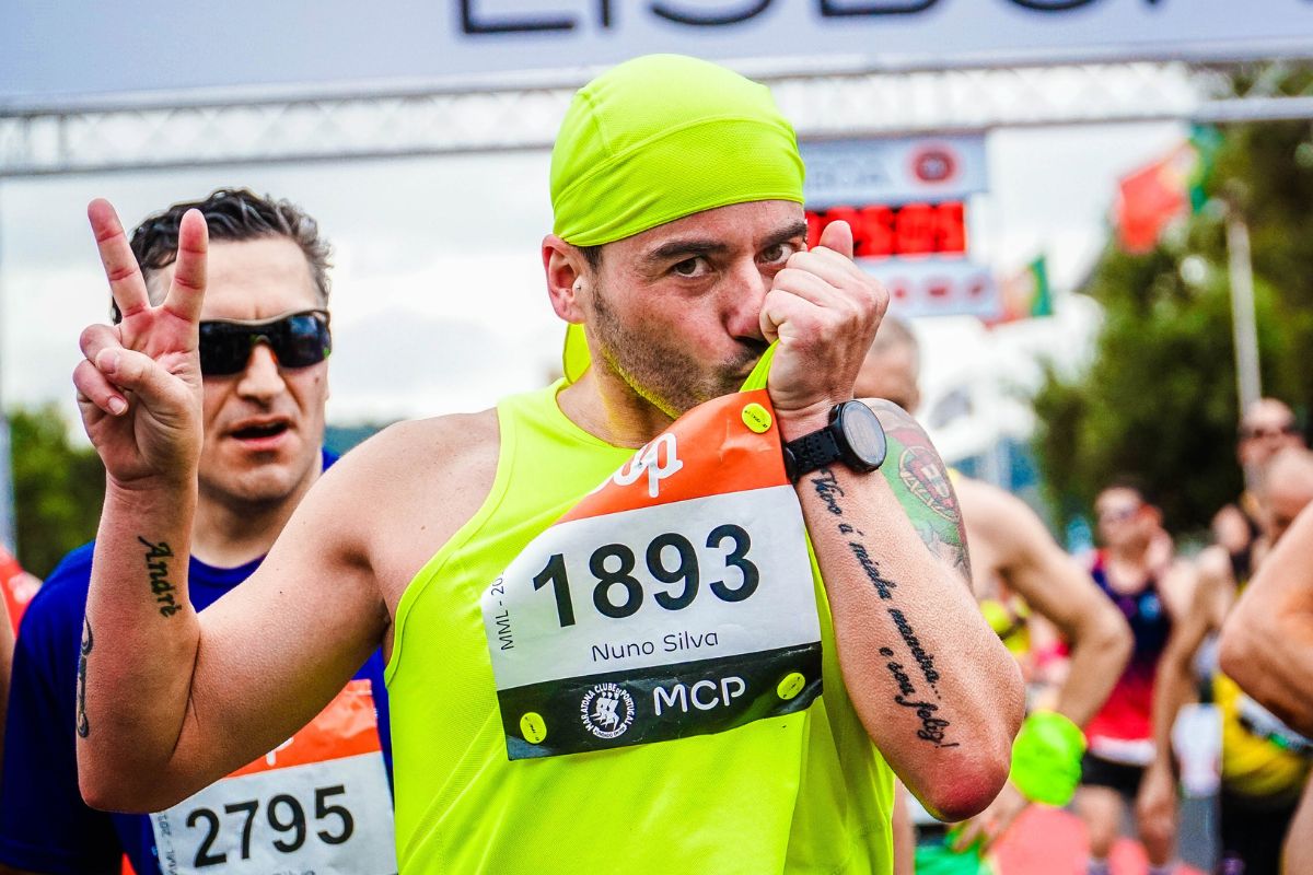 Runners wearing tank tops during a marathon