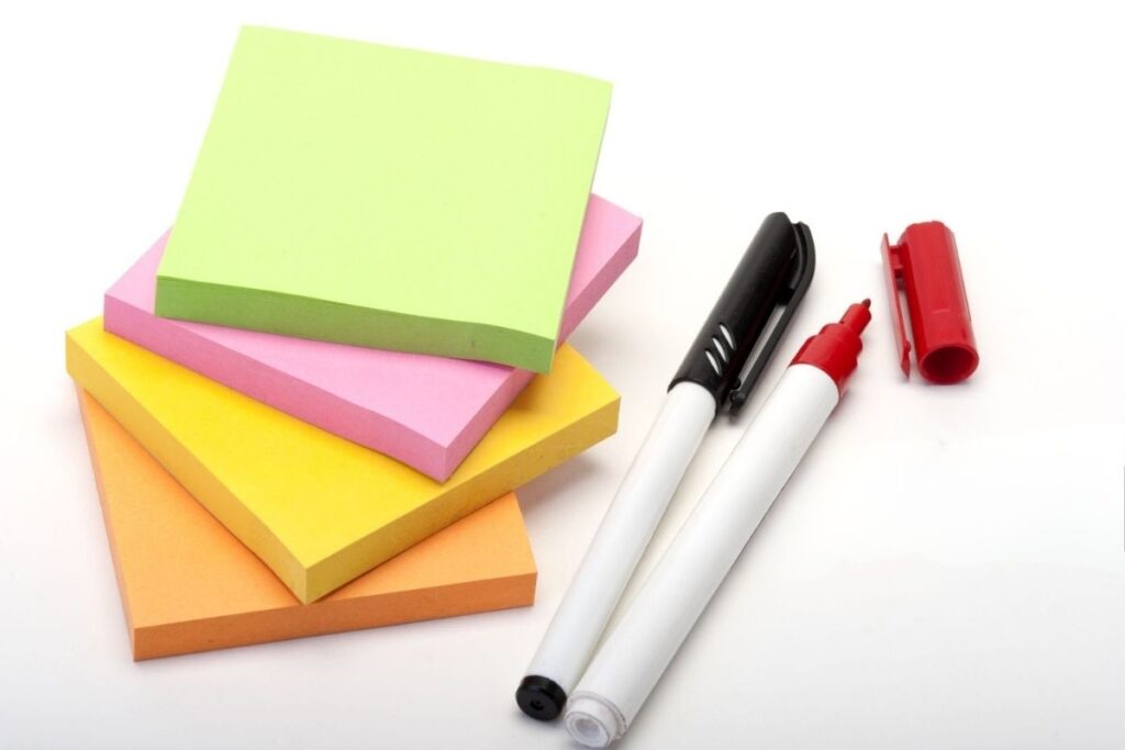 A collection of recycled sticky notes arranged together