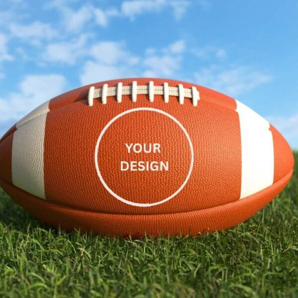 A custom designed football lying on a field
