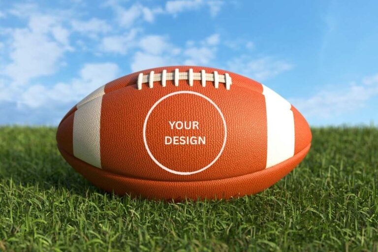 A custom designed football lying on a field