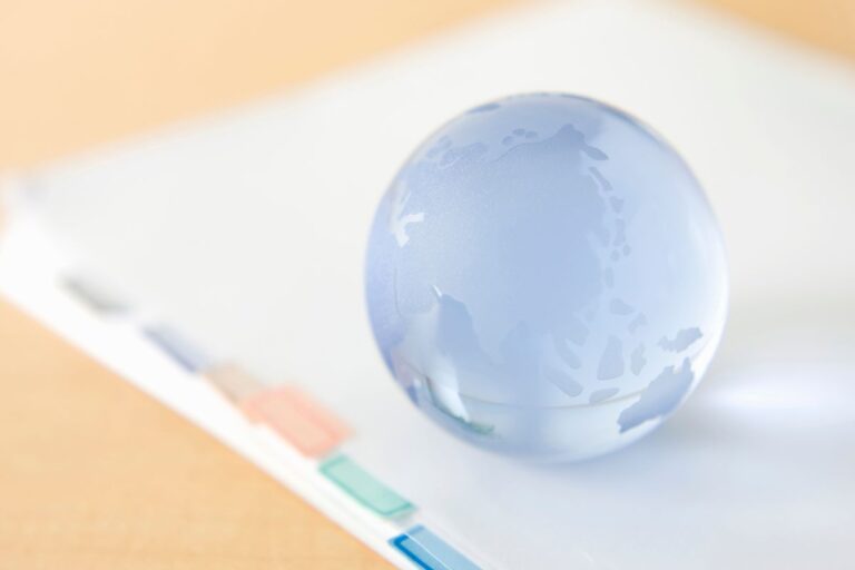 A custom paperweight placed on top of some documents