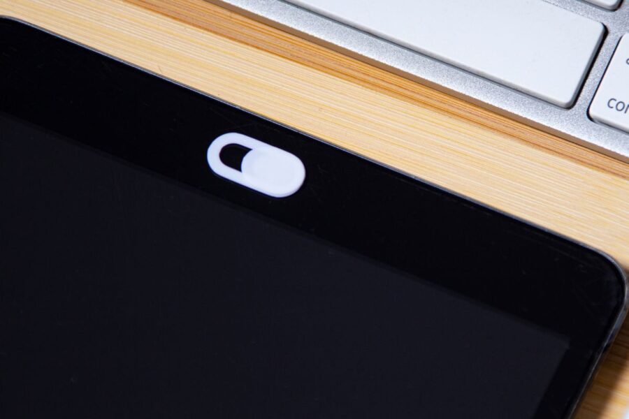 A custom slim magnetic webcam cover placed on a tablet