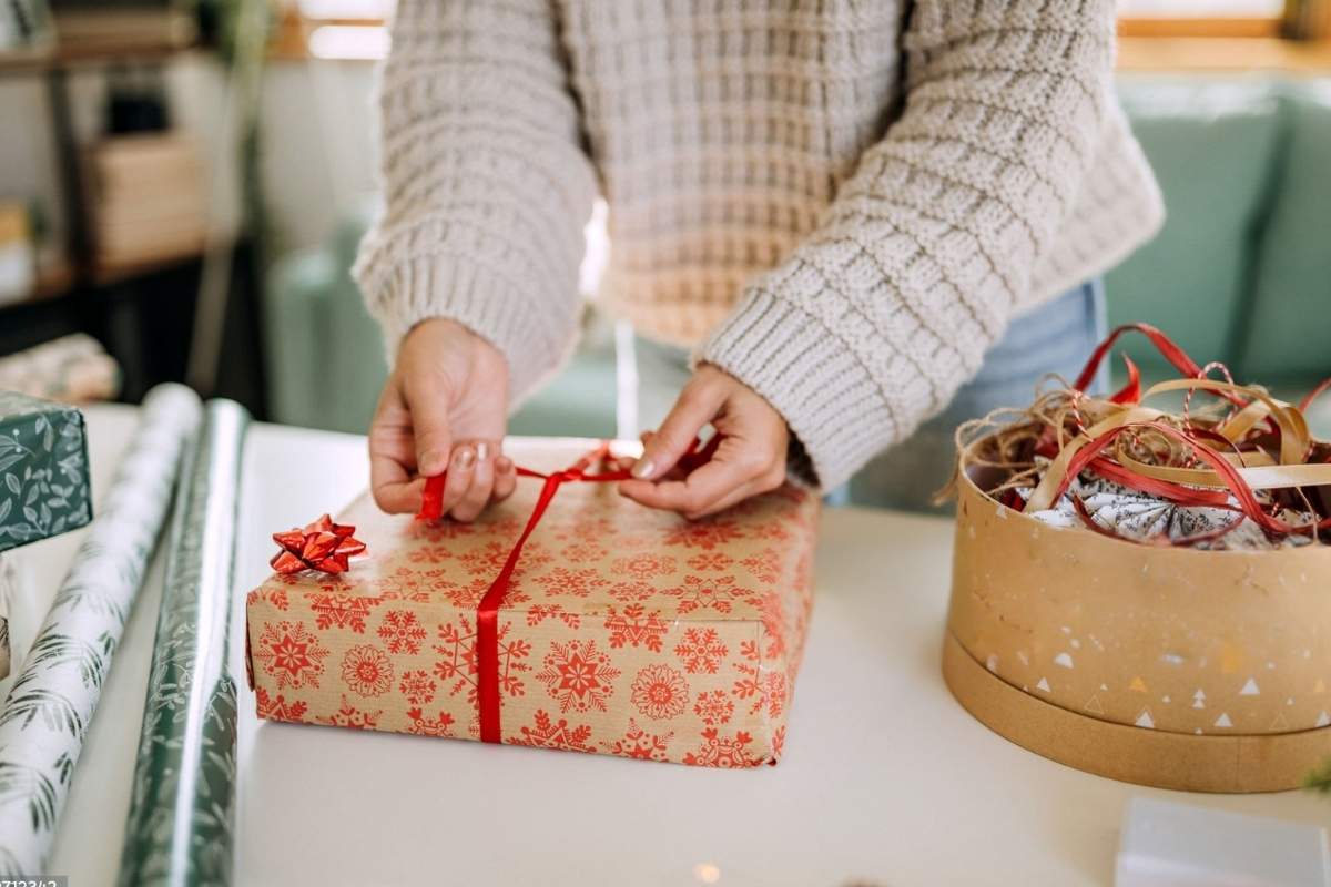 A lady packing her gift basket
